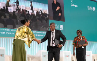 As cities face rising climate pressures, discussions during the Dialogue on The Climate-Housing Nexus highlighted the need to connect housing, land, infrastructure and climate action to build more resilient and inclusive communities. Pictured: Anne-Marie Dias Borges with Susil Ranasinghe and Elizabeth Maruma Mrema. © UN-Habitat / Nika Vekilova